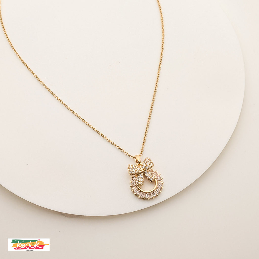Gold Bow Pendant Necklace with Crystals – Elegant Party Wear Jewelry