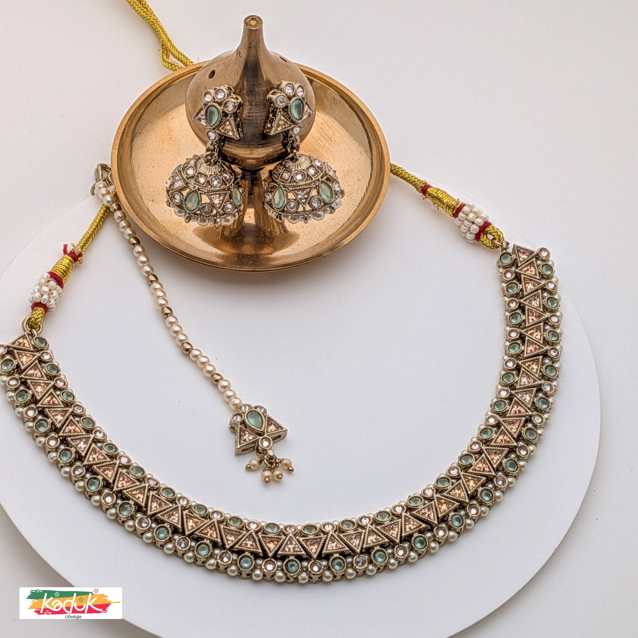 Antique Gold-Plated Necklace Set with Green Stone , Jhumka Earrings & Maang Tikka