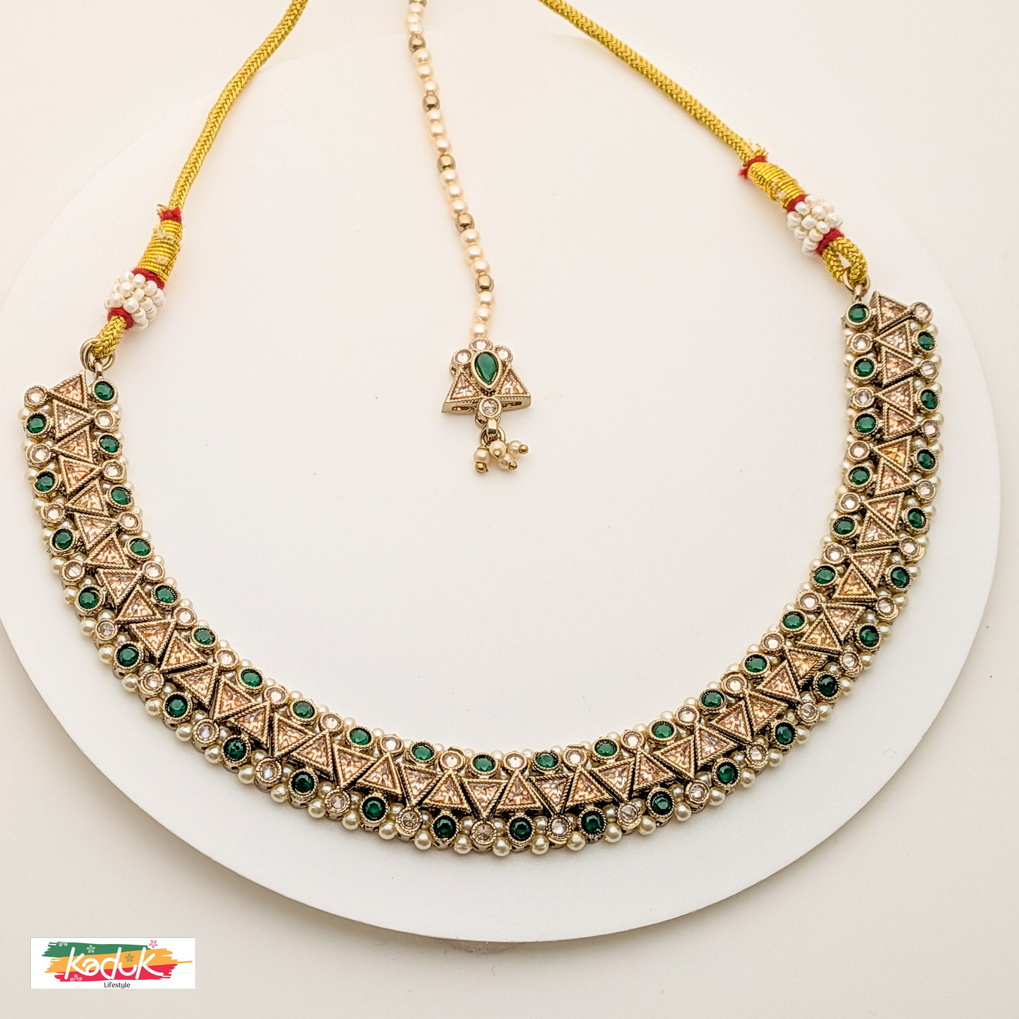 ntique Gold-Plated Necklace Set with Green Stones , Jhumka Earrings & Maang Tikka