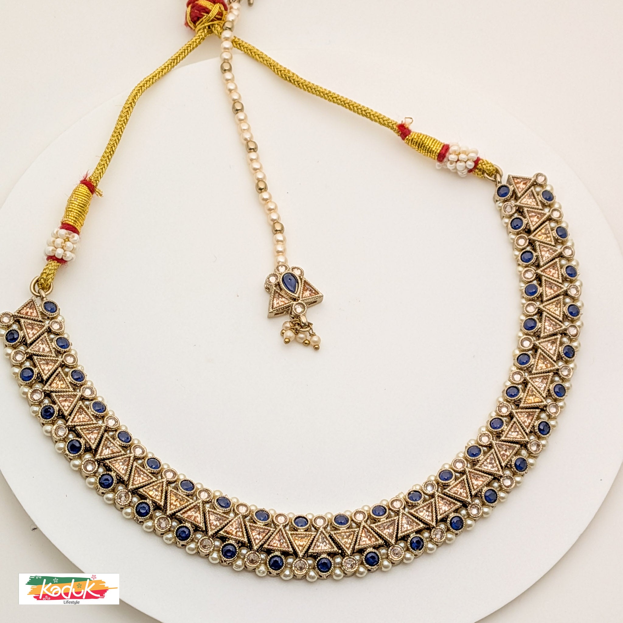 Antique Gold-Plated Necklace Set with Royal Blue  Stones, Jhumka Earrings and Maang Tikka