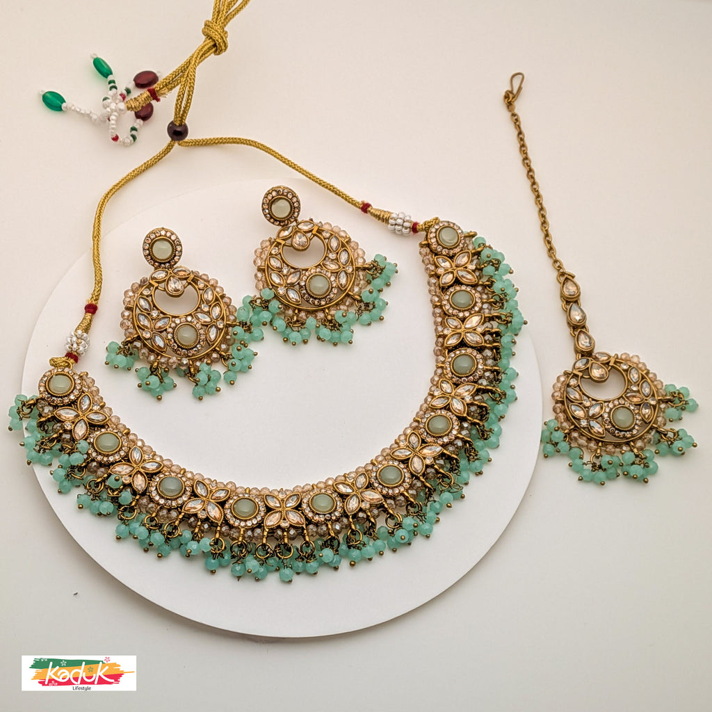 Gold-Plated Kundan Necklace Set with Green Beads, Earrings & Maang Tikka