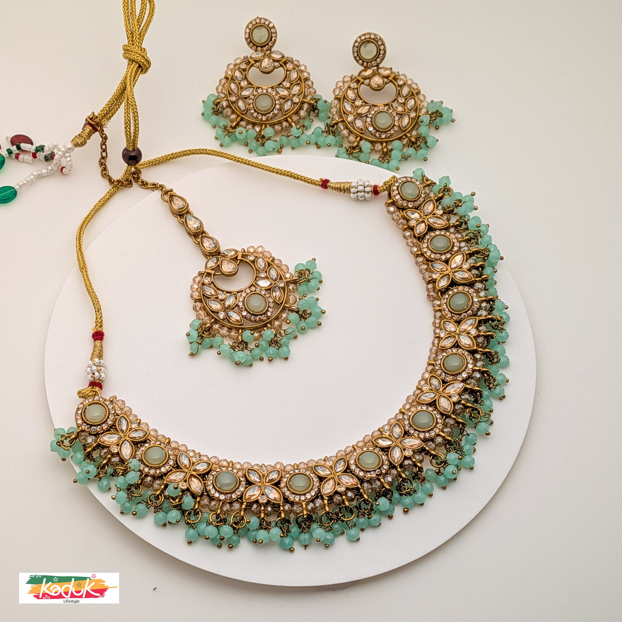 Gold-Plated Kundan Necklace Set with Green Beads, Earrings & Maang Tikka