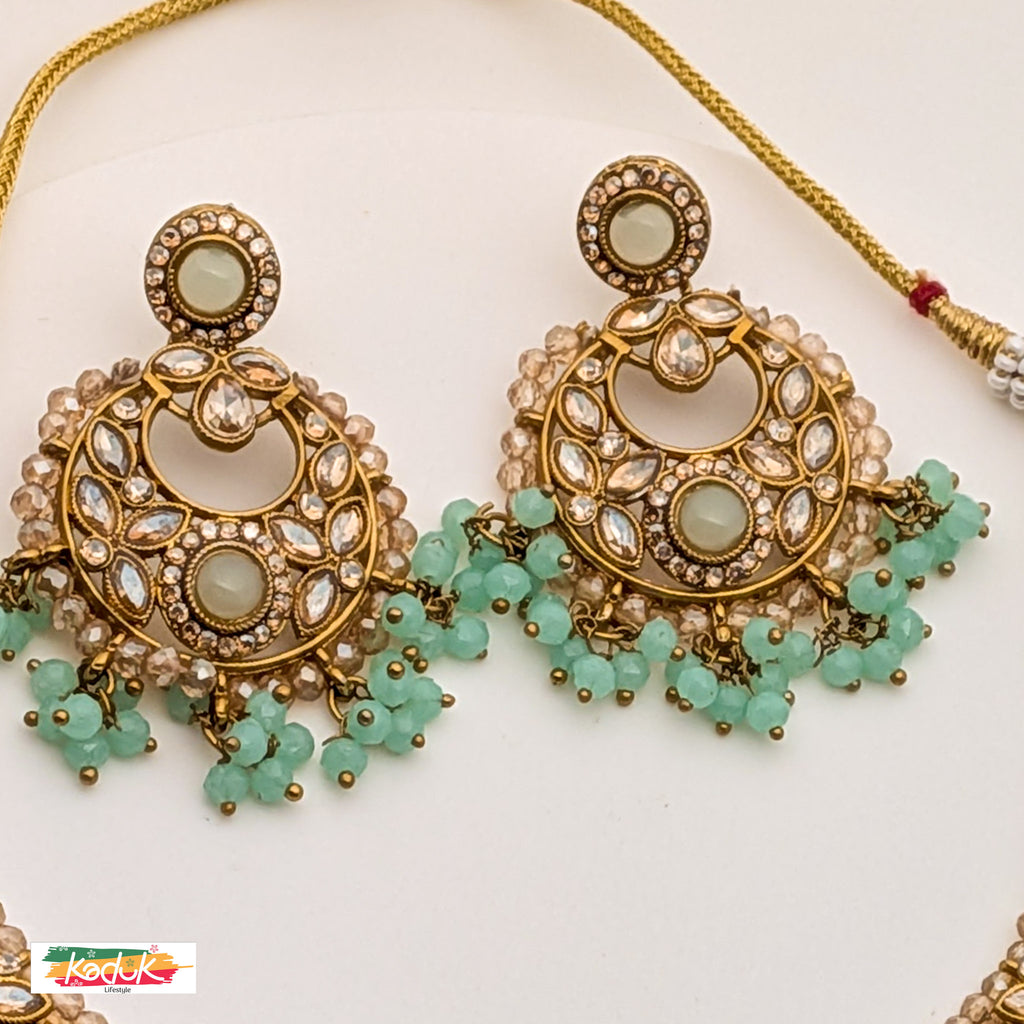 Gold-Plated Kundan Necklace Set with Green Beads, Earrings & Maang Tikka