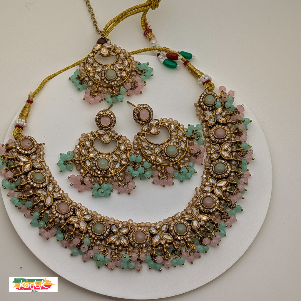 Gold-Plated Kundan Necklace Set with Green and Pink  Beads, Earrings & Maang Tikka