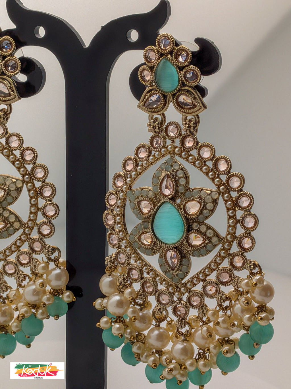 Gold-Plated Kundan Oversized Earrings with Mint Green Stones & Pearl Drops