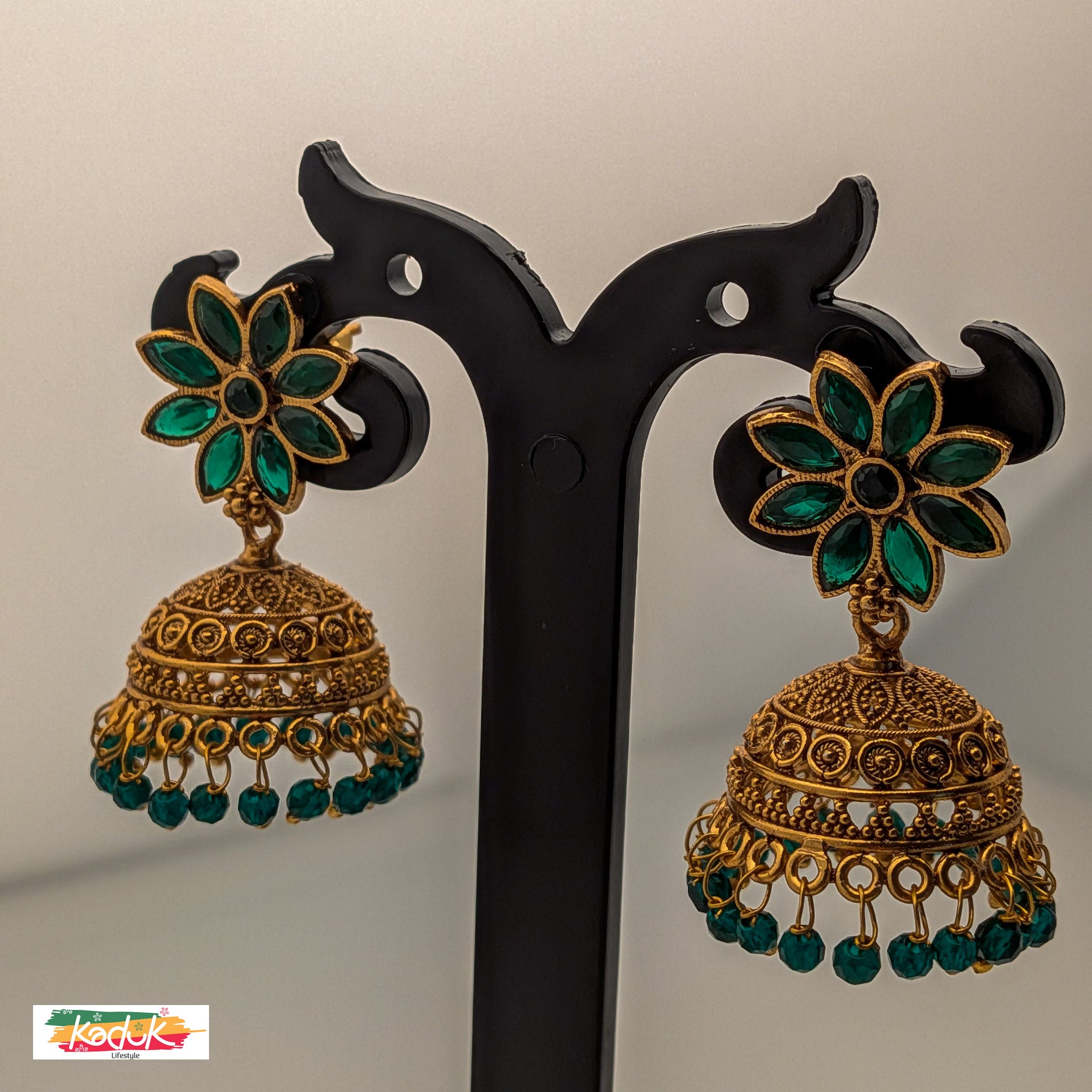 Emerald Floral Jhumka Earrings – Antique Gold with Green Beads