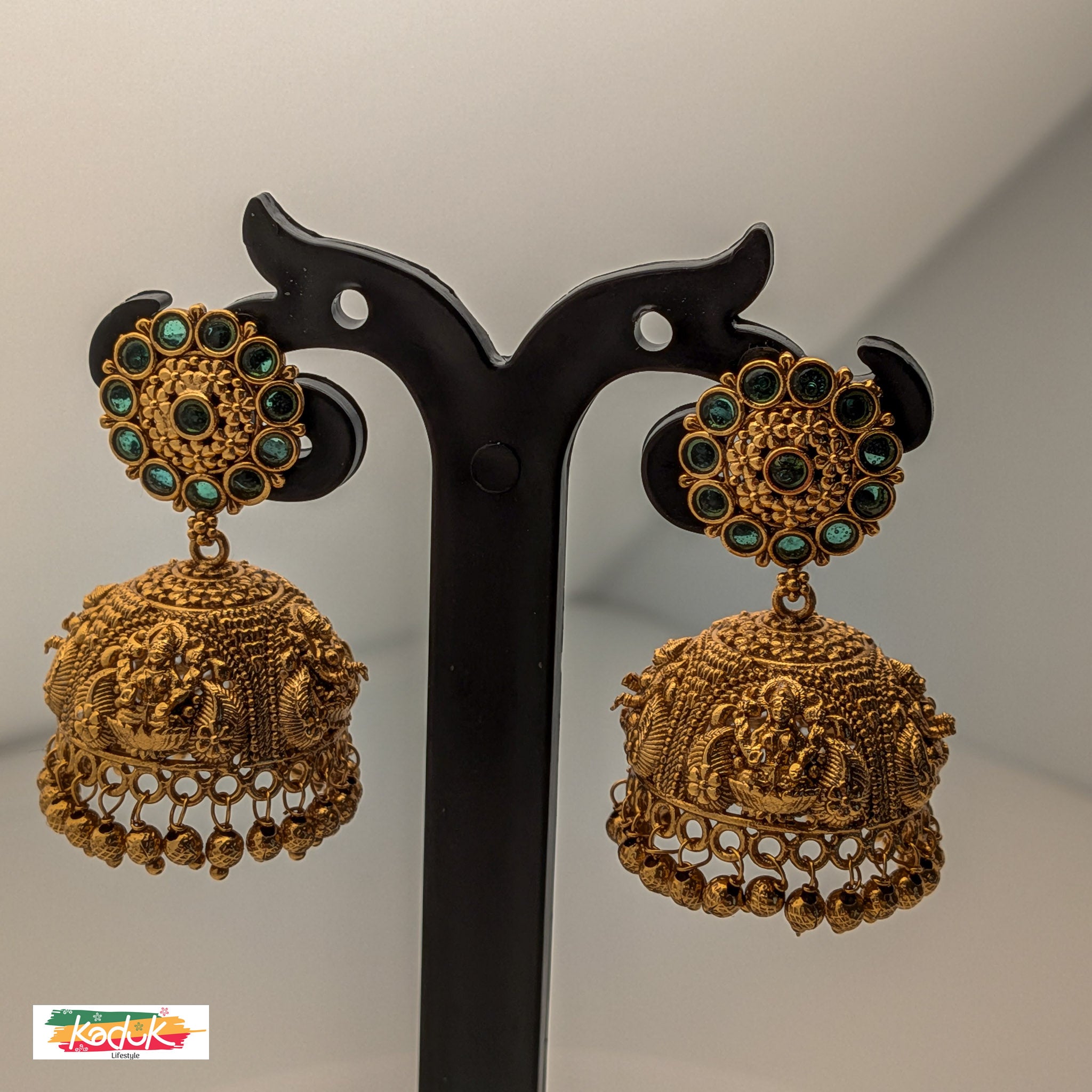 Antique Temple Jhumka Earrings – Goddess Motif with Green Stone Stud