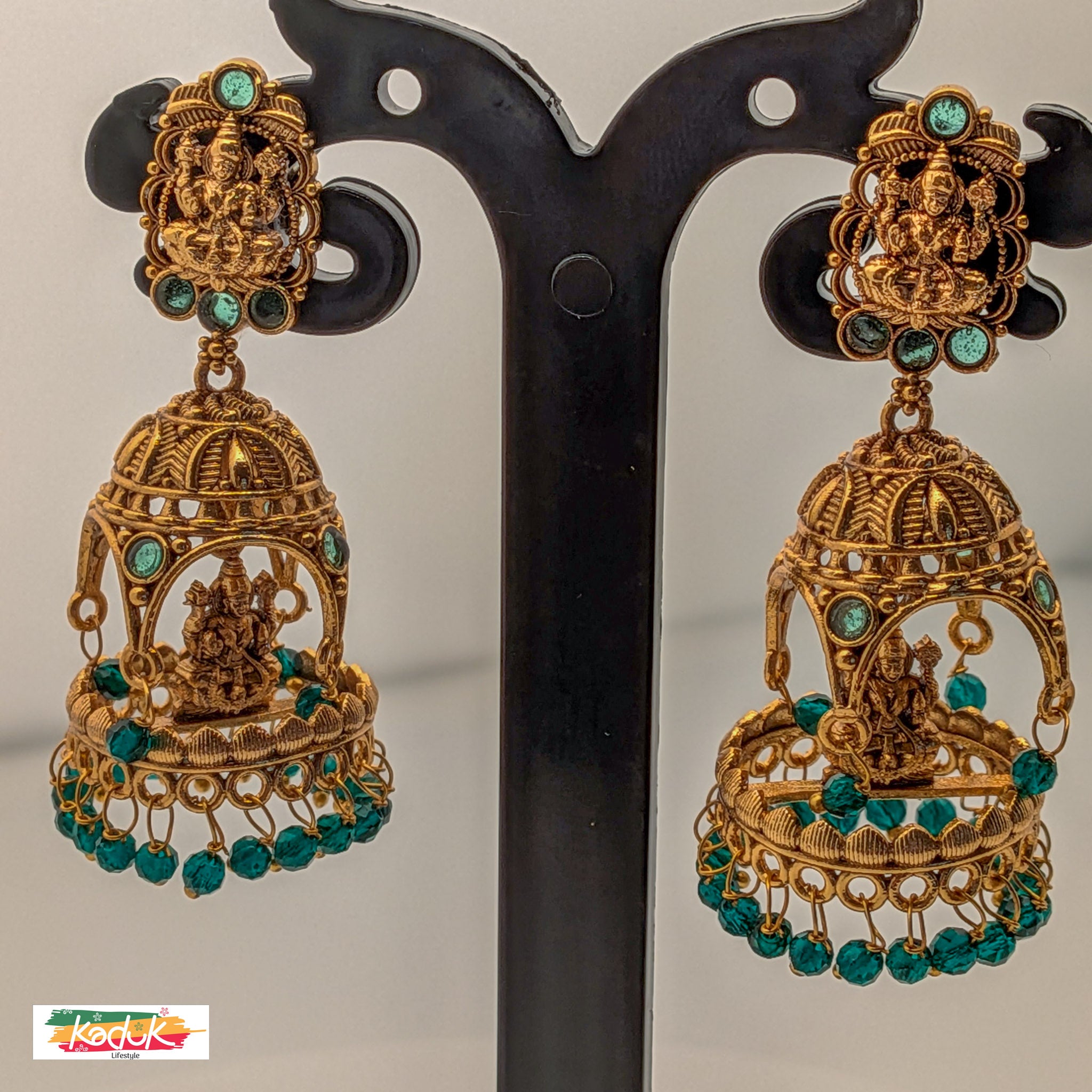 Temple Dome Jhumka Earrings with Green Beads – Antique Gold Finish