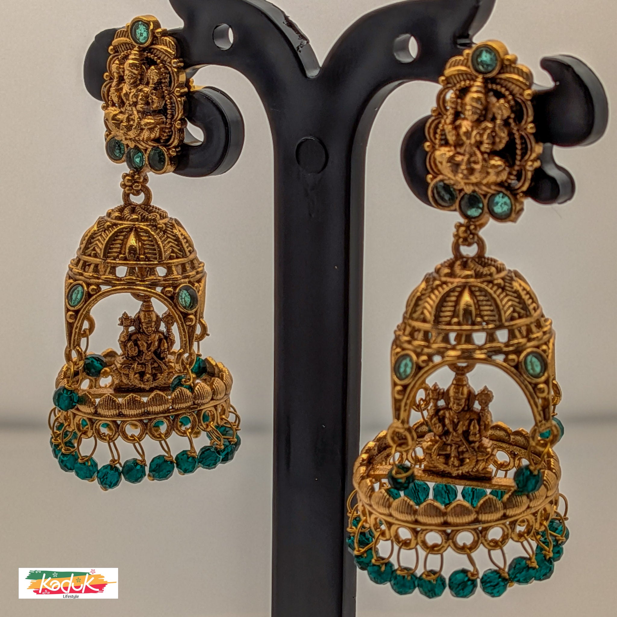 Temple Dome Jhumka Earrings with Green Beads – Antique Gold Finish