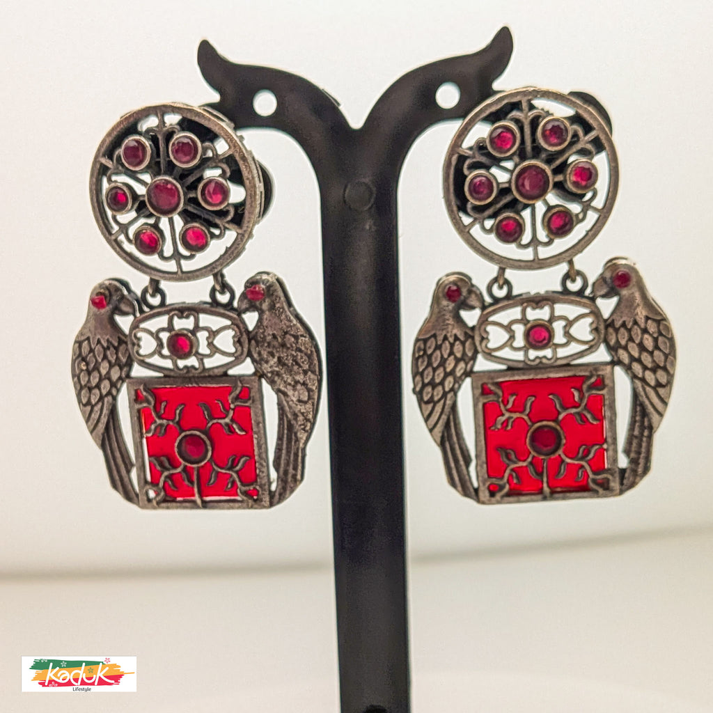 Oxidized Silver Parrot Motif Stud Earrings with Ruby Red Enamel Work