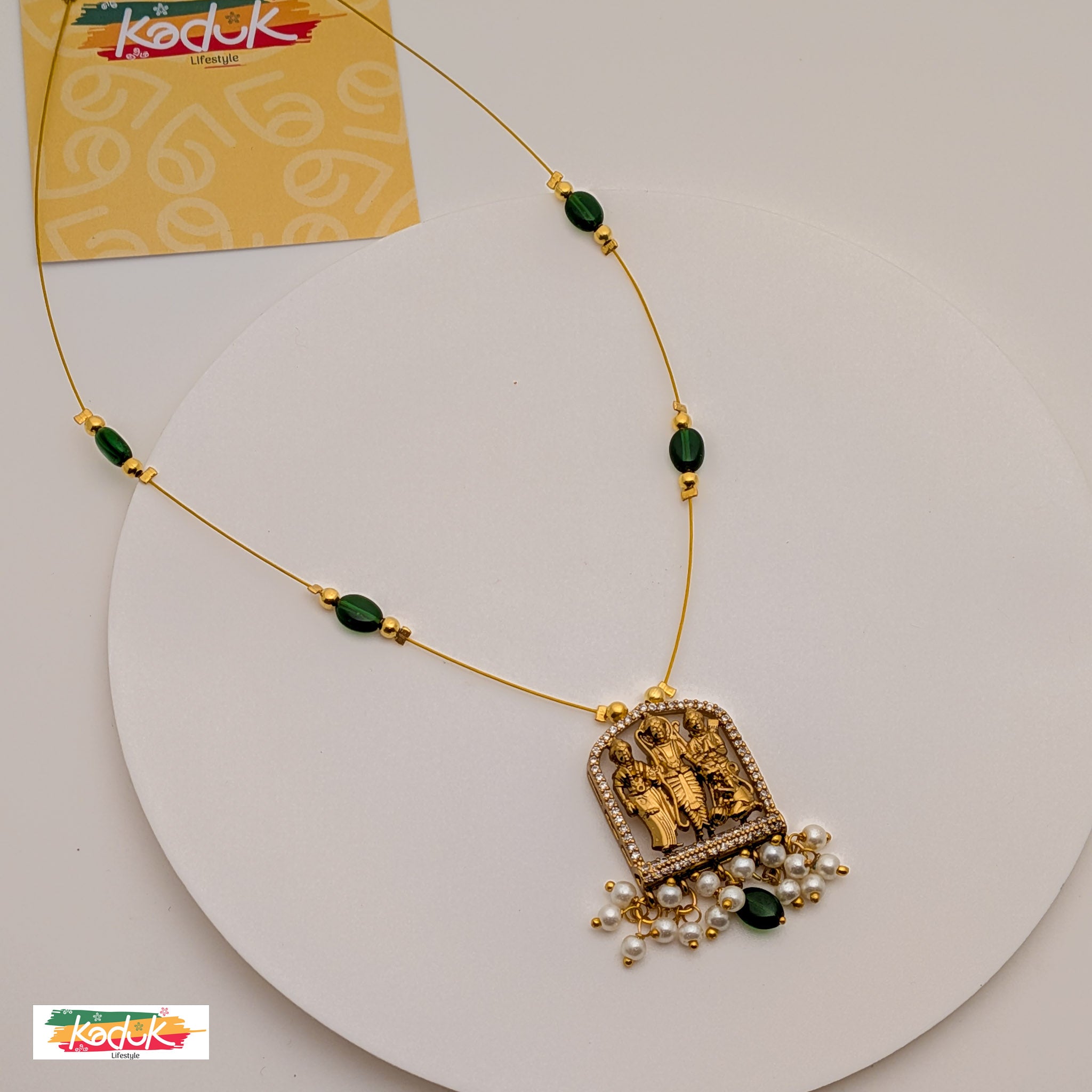 🌸 Temple Necklace with Ram–Sita Pendant, Emerald  Beads & Pearl Detailing