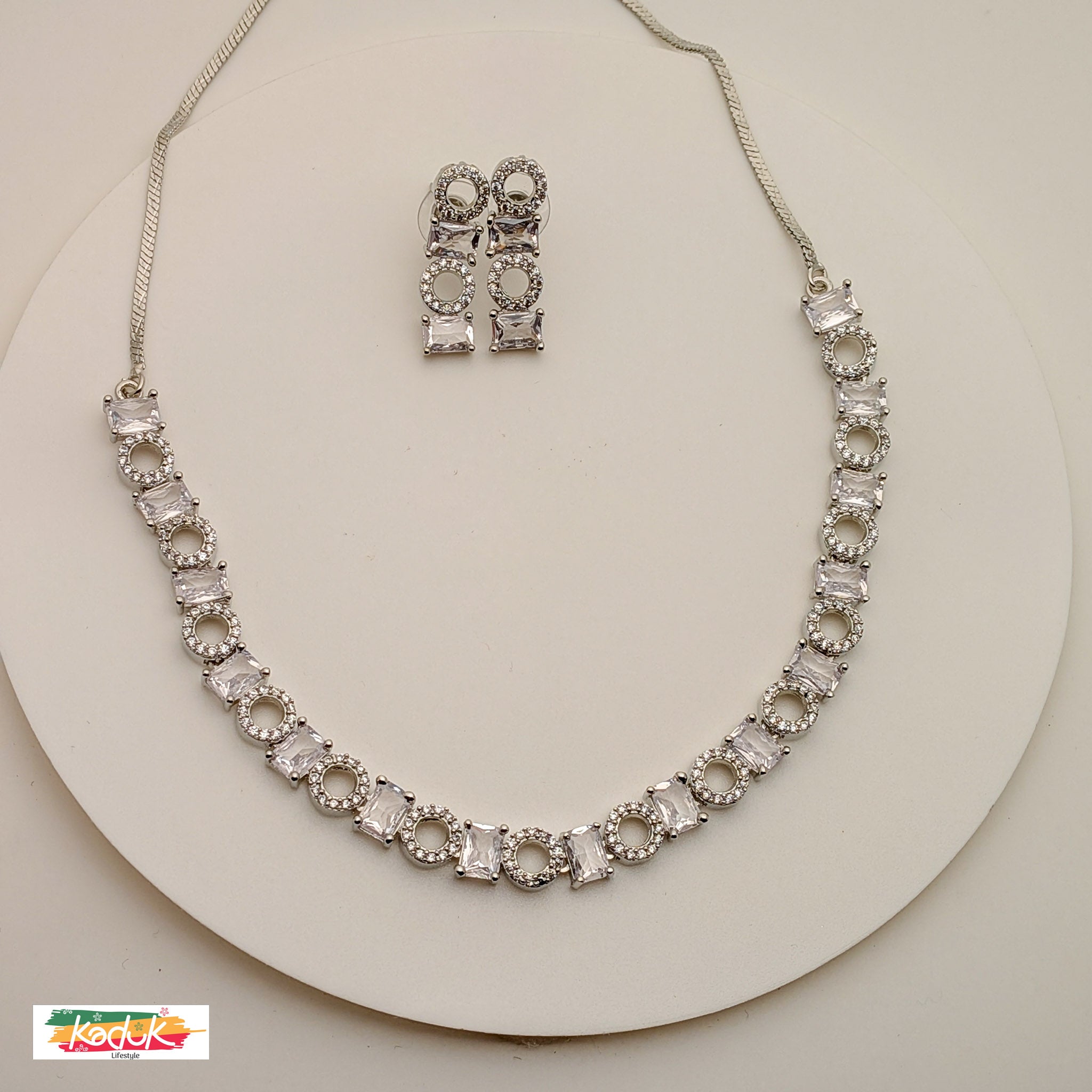 Elegant Silver AD  Necklace with Rectangular & Round Crystal Motifs – Matching Earrings