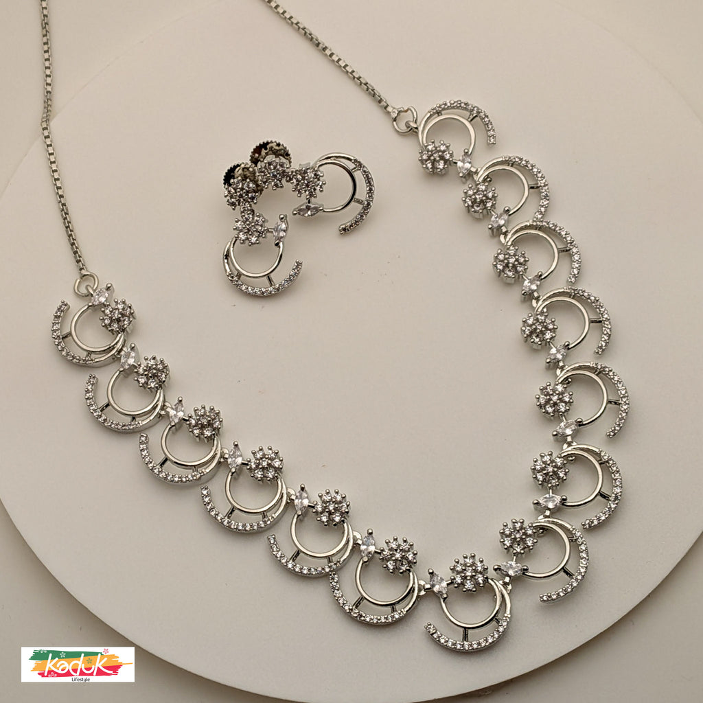 🌙 Silver AD Crescent Crystal Necklace with Floral Accents & Earrings