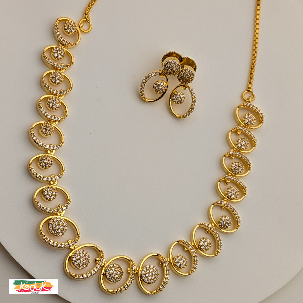 Gold Oval Necklace with Crystal Ball Accents & Earrings