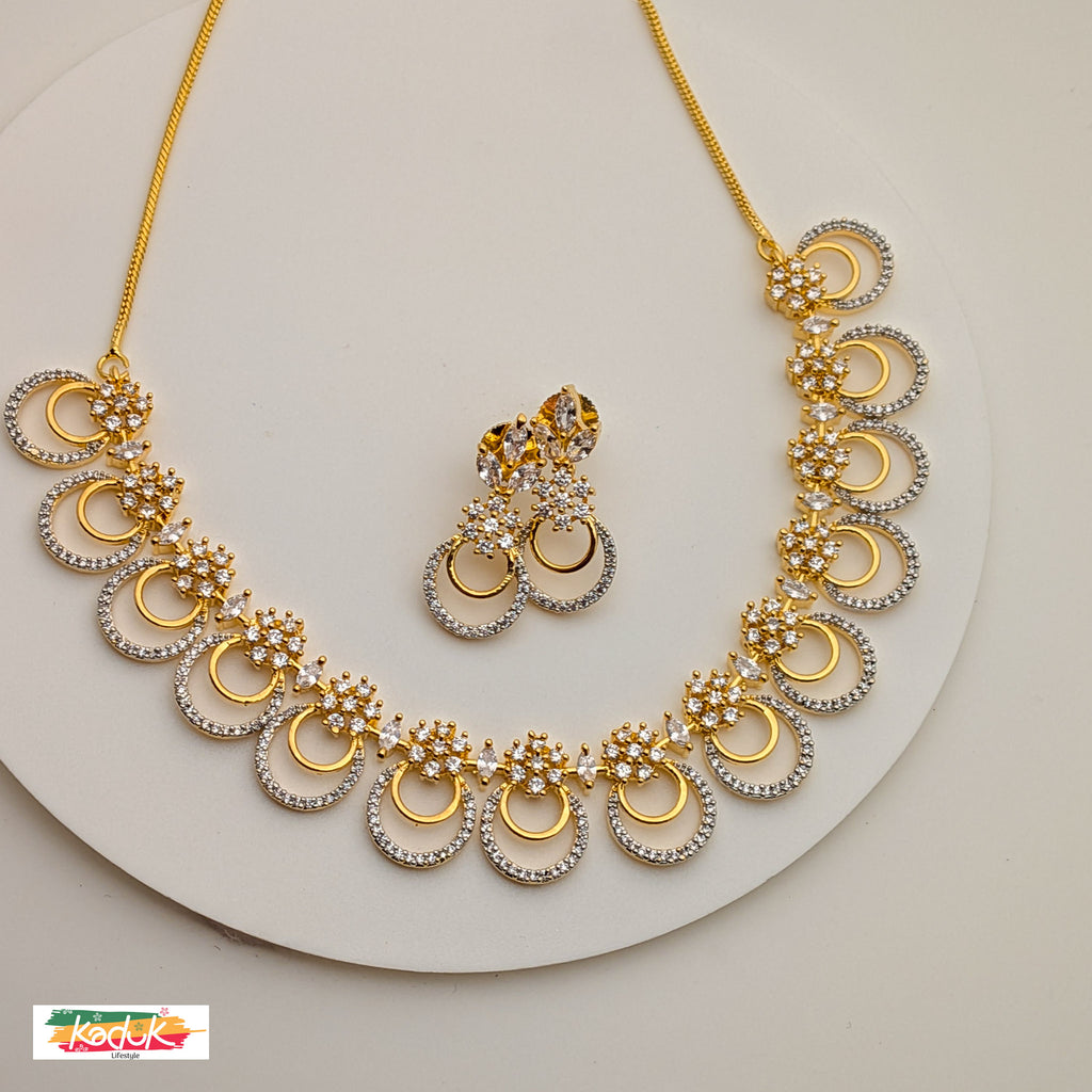 Dual-Tone Gold & Silver Necklace with Crystal Floral Motifs & Earrings