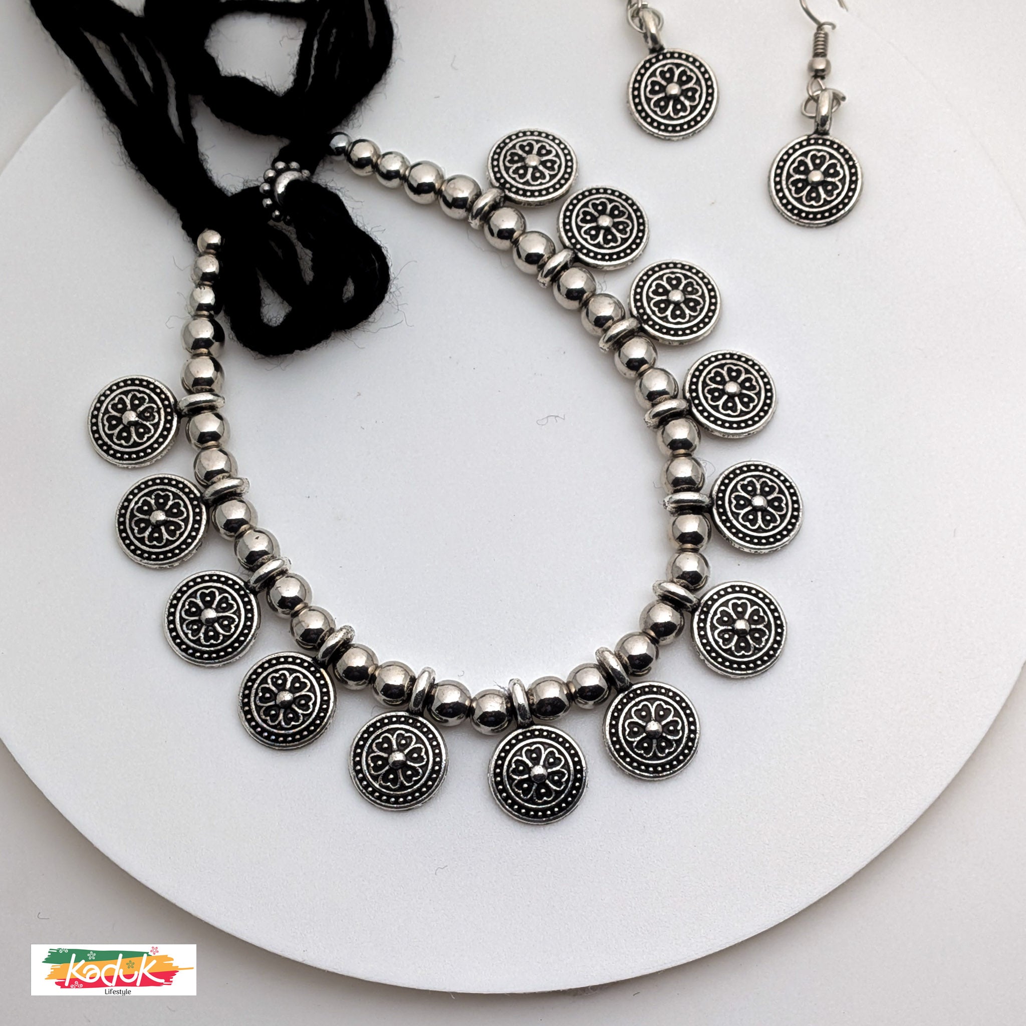 🪙 Antique Silver Coin Necklace with Floral Motifs & Earrings